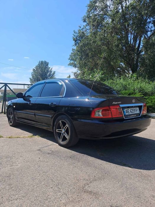 Продам Kia Madgentis