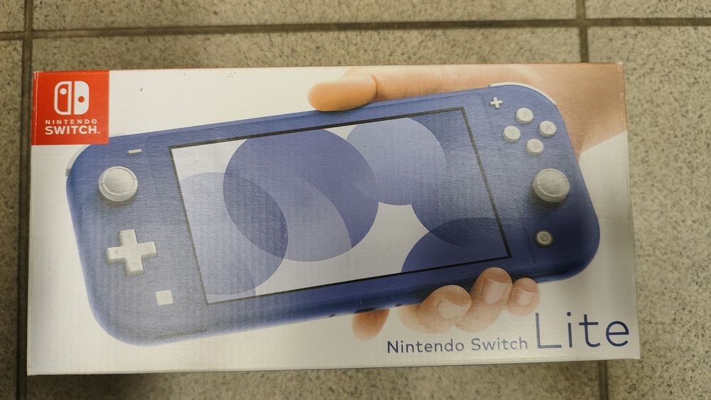 Nintendo Switch Lite + 2 gry