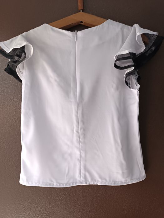 Продам нарядні блузи для дівчинки