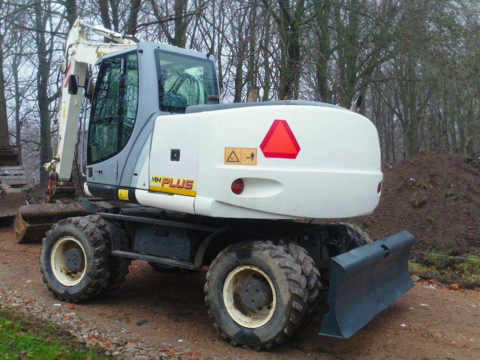 Koparka New Holland MH Plus O&K Volvo  Zamiana Walec Ciągnik siodłowy