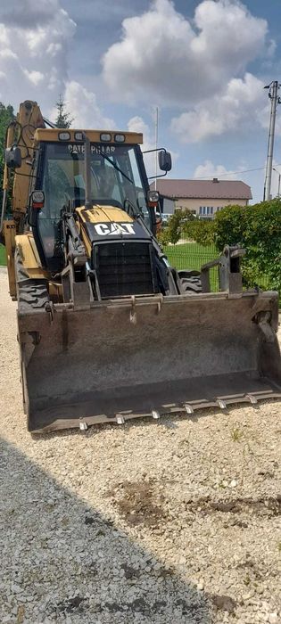 Koparko-ładowarka CAT 428 D