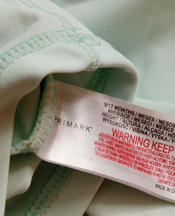 Primark Kombinezon kąpielowy dinozaur dino uroczy
