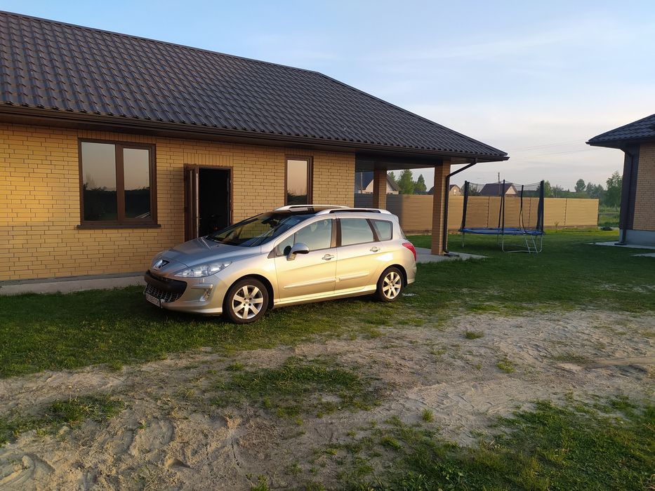 Peugeot 308 SW T7 2009 рік