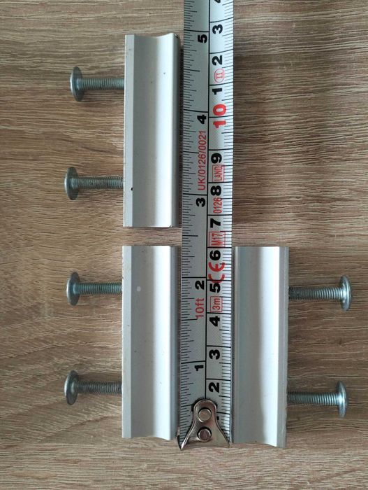 Uchytwy do mebli/stopki pod meble