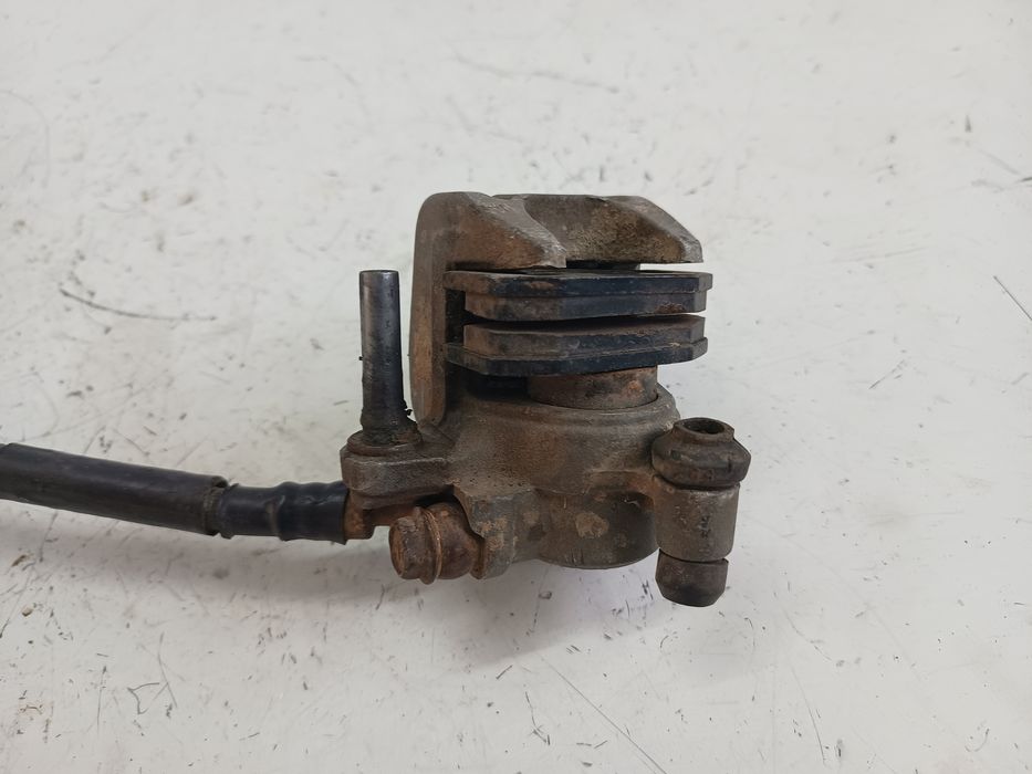 Zacisk hamulcowy tył tylny pompa hamulcowa tył Suzuki RM 125 / 250 95r