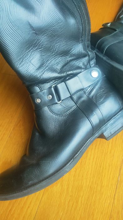 Botas cano alto. Pele