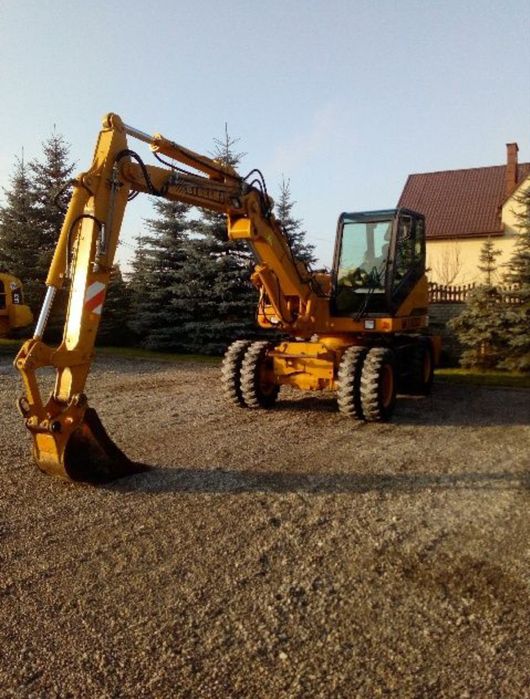 Usługi koparko-ladowarką, koparką transport wywrotka piachu, kruszywa