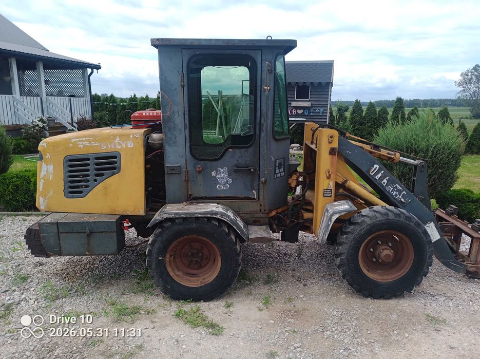 Mini ladowarka ładowacz 1000 kg udzwigu zamiana na mini koparka