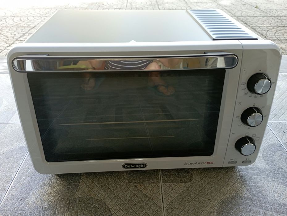 Forno eléctrico DeLonghi 24L 1800w