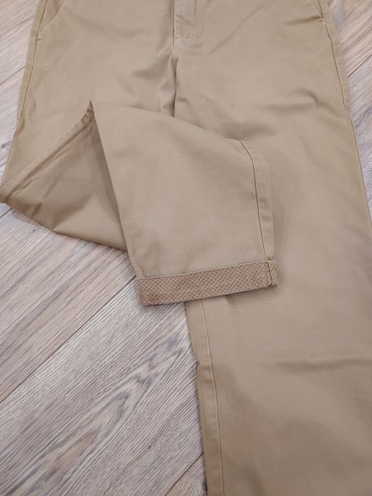 Eleganckie  brązowe spodnie męskie zara