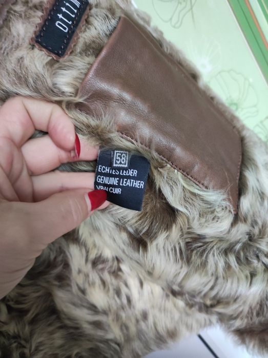 Мужская кожаная куртка с мехом волка