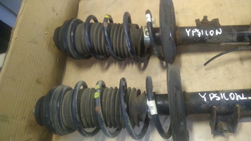 ) Lancia Ypsilon amortyzatory przód prawy lewy piasta zwrotnica
