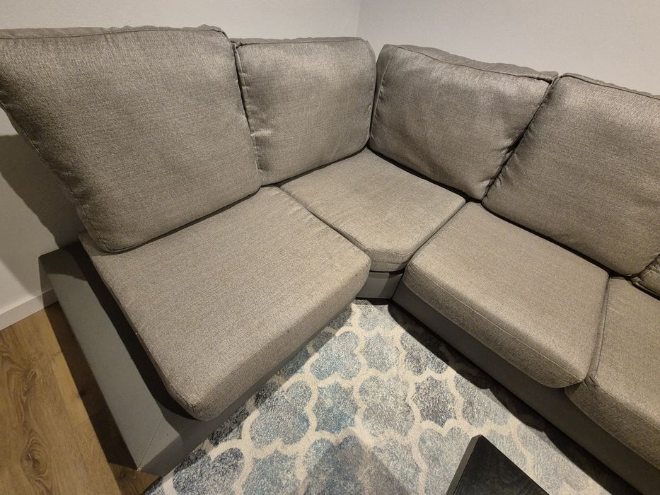 Sofá cinza de canto