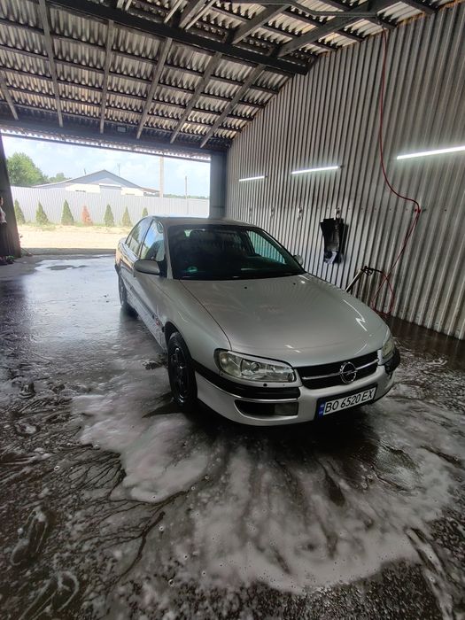 Опель омега б 2.0 газ бензин