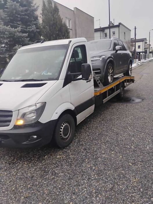 Pomoc Drogowa autolaweta Samochód zastępczy