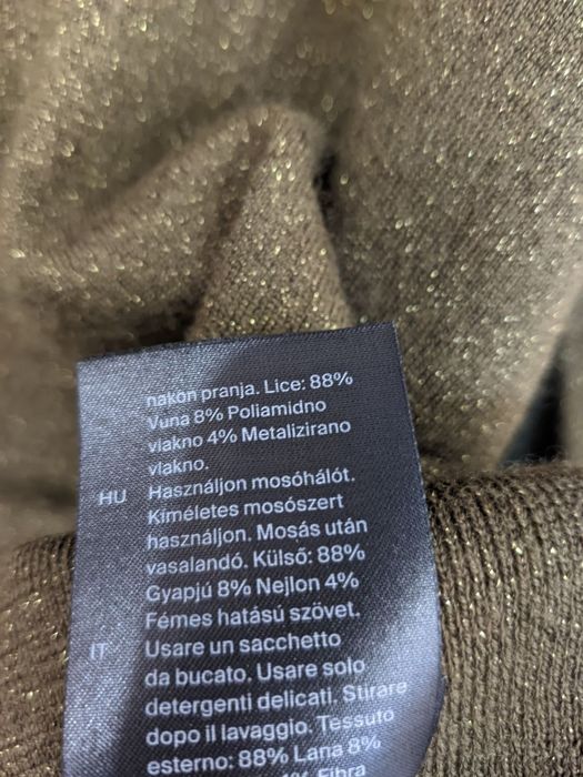 Светр вовна від бренду COS