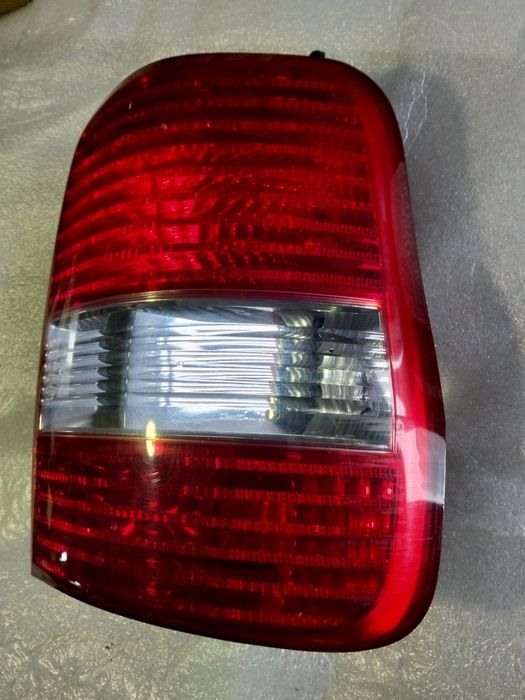 Farolim Kia carnival original Kia sedona 2002  DRT