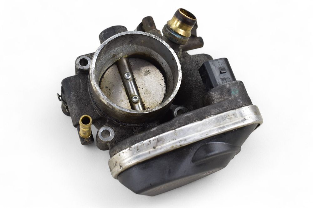 Przepustnica OPEL ASTRA H ZAFIRA B CHEVROLET CRUZE 1.6 1.8 16V 55560398