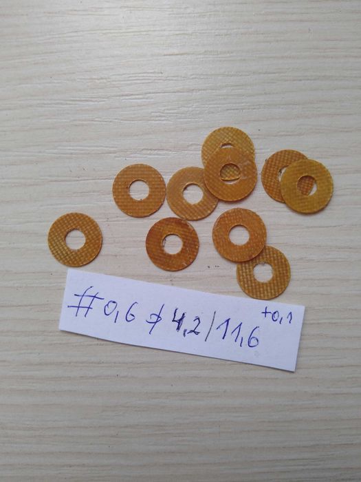 Podkładki montażowe bakelitowe #0,6 fi 4,2/11,6 mm