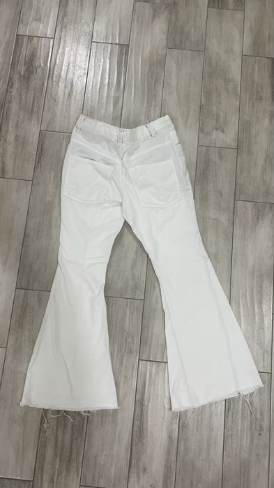 white flared jeans