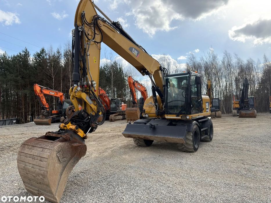 Caterpillar 313d  Koparka kołowa Plywajaca łyżka , centralne smarowanie , rotor