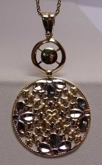 Złota dwukolorowa zawieszka ruchome elementy.