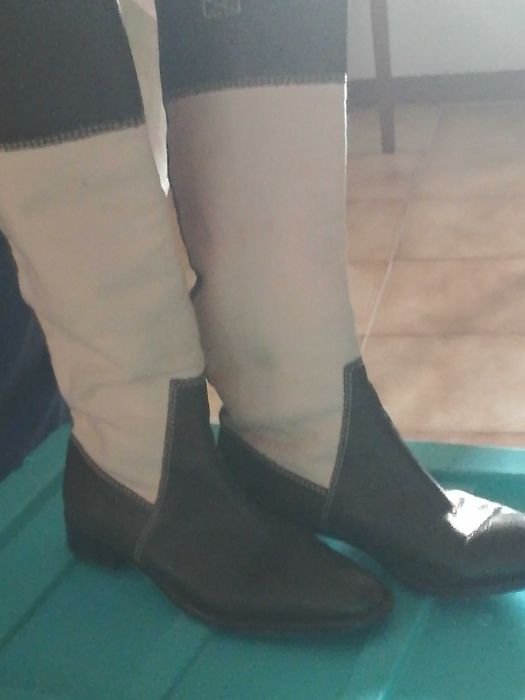 Botas altas pelo joelho