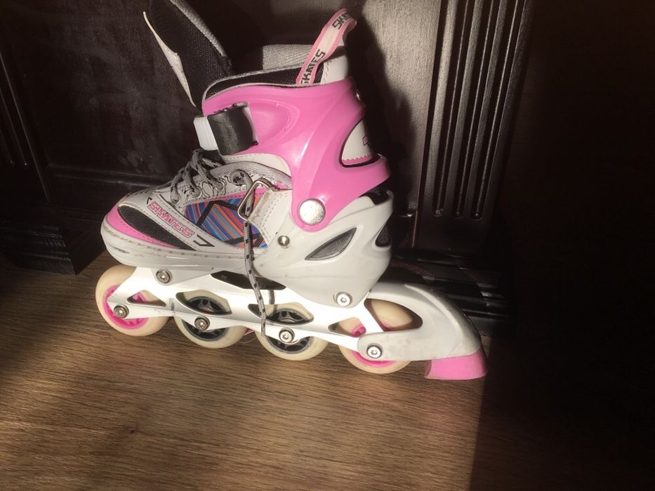 Роликовые коньки