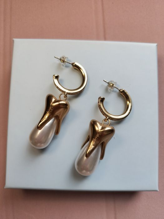 Серьги Schiaparelli.