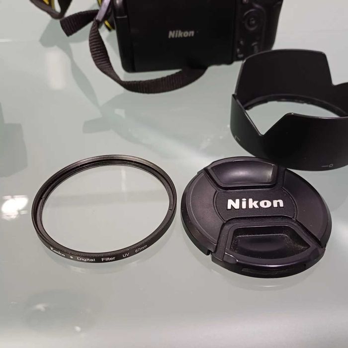 Nikon D5100 + 18-105 mm