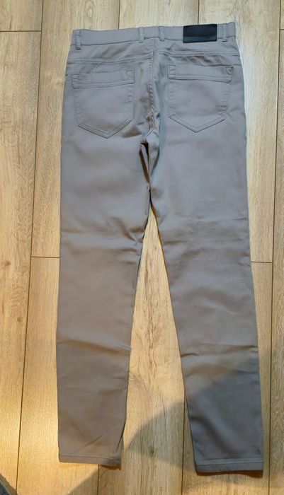 Spodnie męskie slim Reserved rozm. 30