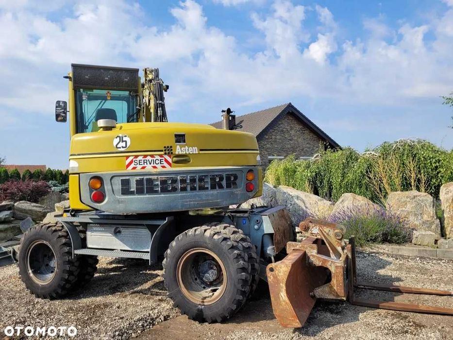 LIEBHERR 309 Klima, 4 łyżki + widły, Nowe opony! Kamera