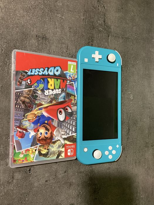 Nintendo Switch Lite 128 GB * stan jak nowy * oryginalna ladowarka *