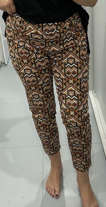 Wzorzyste spodnie H&M aztecki wzór brąz pomarańcz 42 xl jak nowe