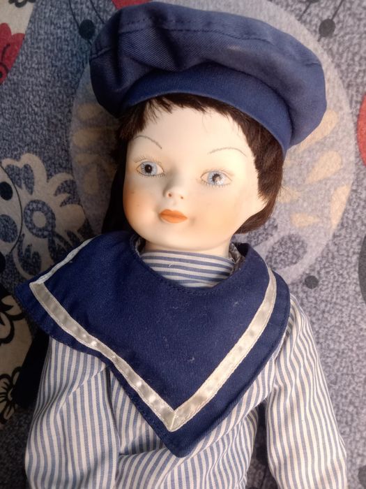 Lalka porcelanowa marynarz