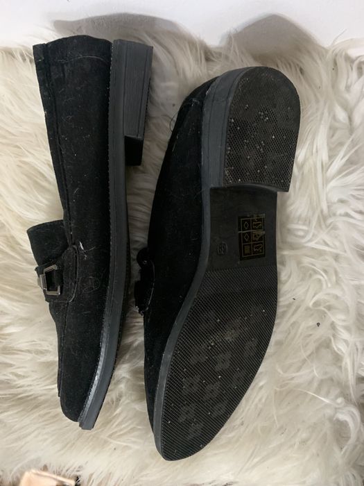 Buty na płaskim obcasie