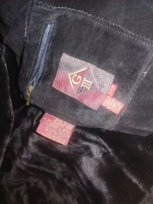 Casaco em Pele e mala em pele