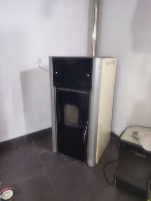 Caldeira pellets e radiadores aquecimento