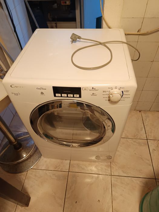 Máquina de secar roupas