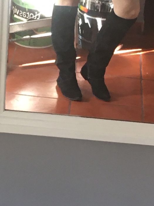 Botas pretas longas