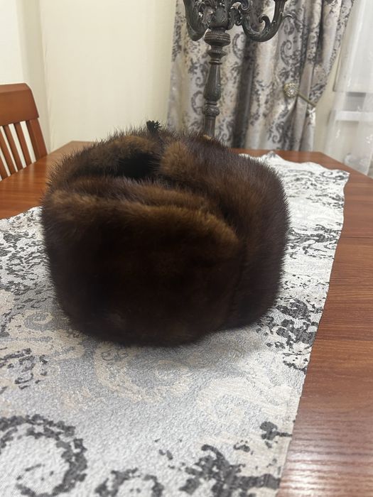 Шапки ушанки та норкова