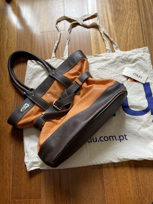 Mala Muu cor de laranja como nova