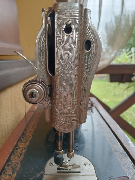 Швейна машинка Подолка