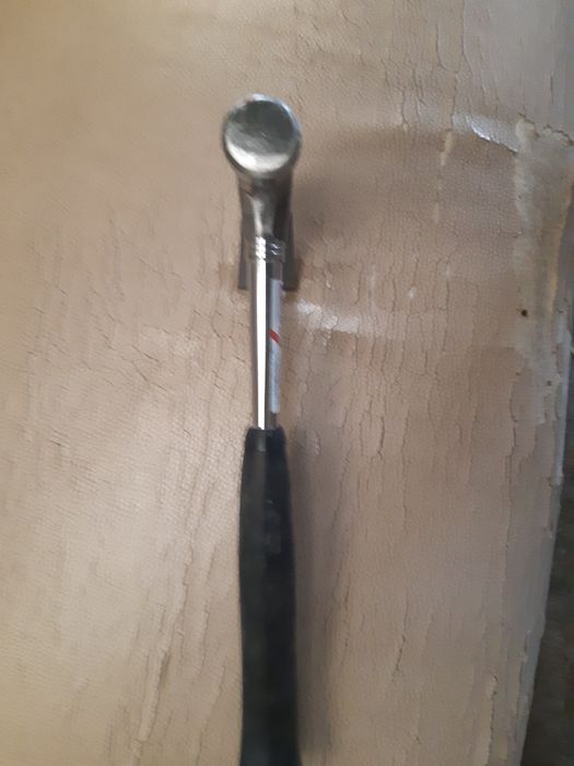 Casaco impermeável + Martelo