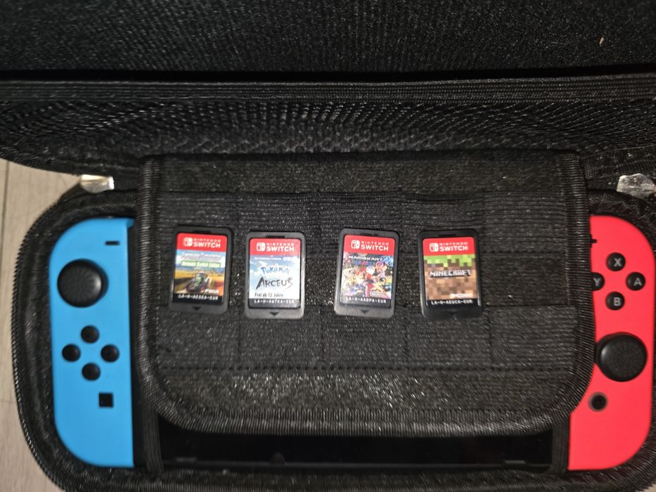 Nintendo Switch + cztery gry