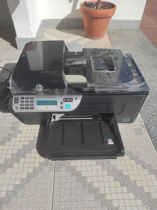 Impressora HP com tinteiros