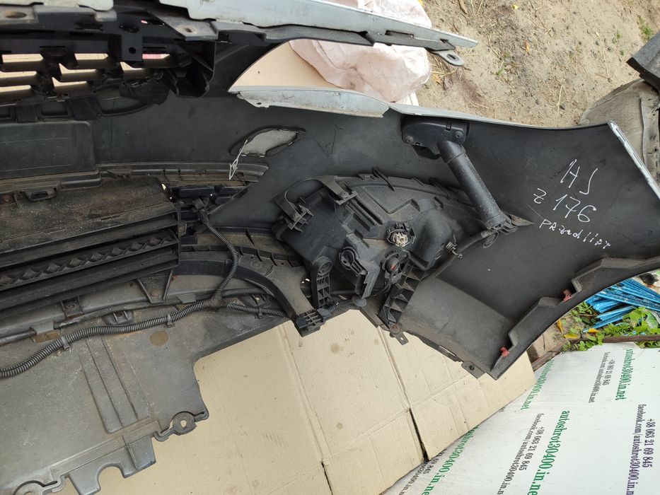 Бампер Opel Astra J передній