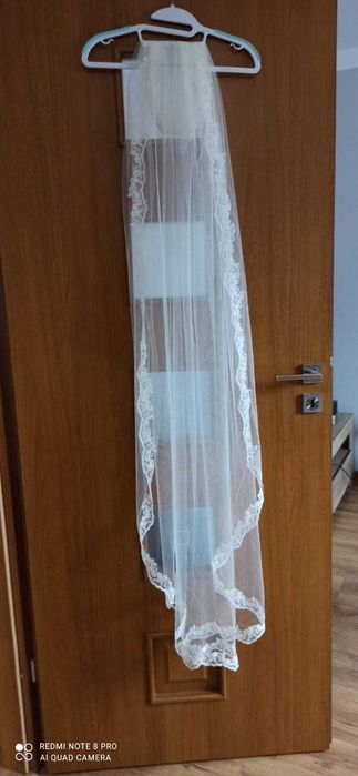 Suknia ślubna z welonem