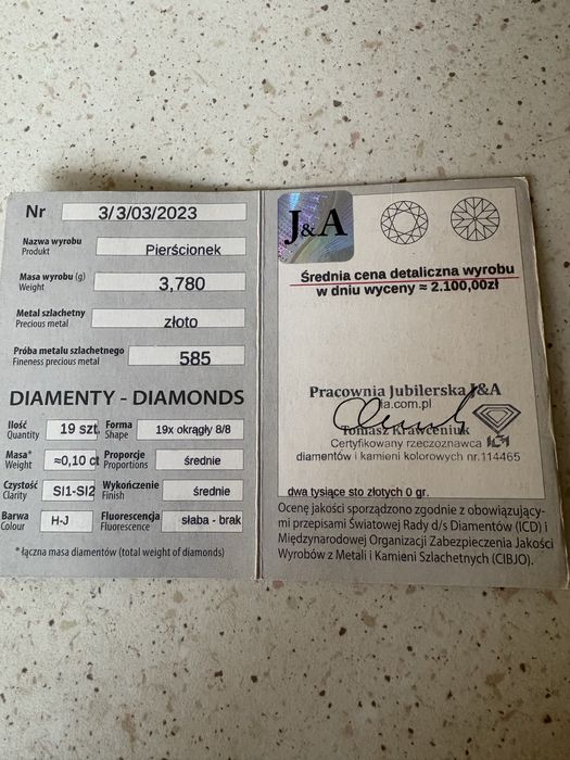 Pierścionek złoty z diamentami certyfikat próba 585
