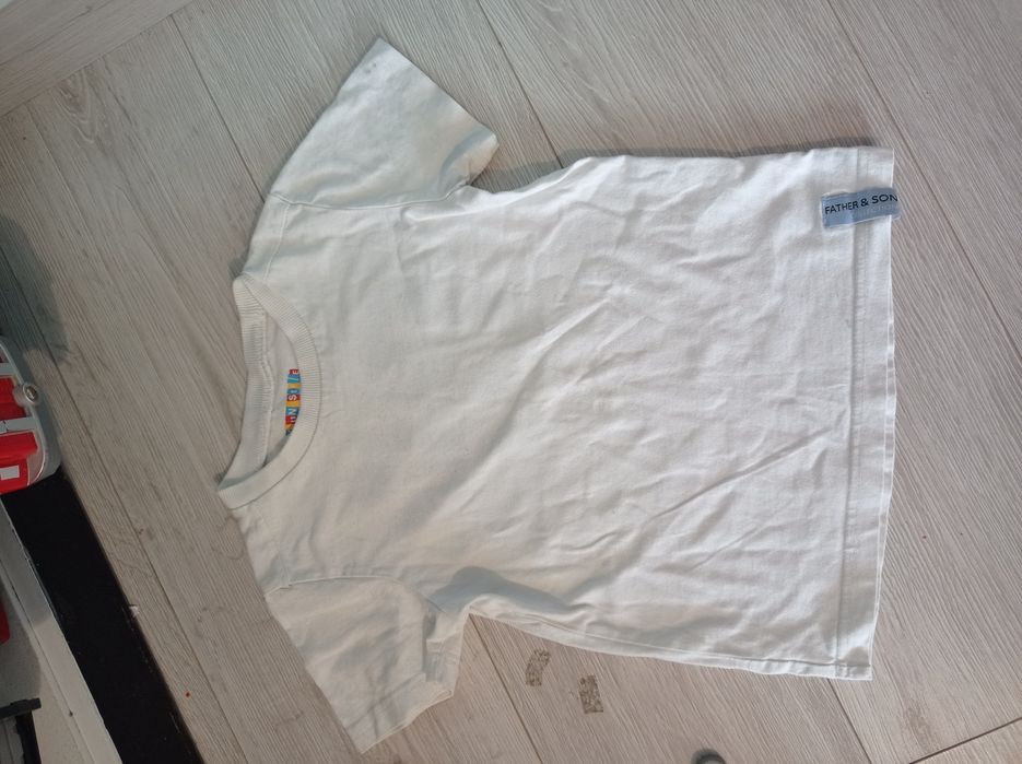 Biała bluzka z numerem 110/116